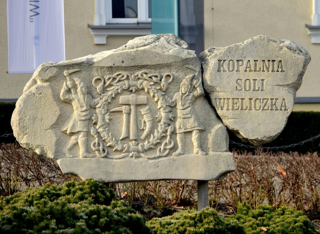 Stone sculpture at the entrance of Wieliczka Salt Mine in Poland, a UNESCO World Heritage Site.